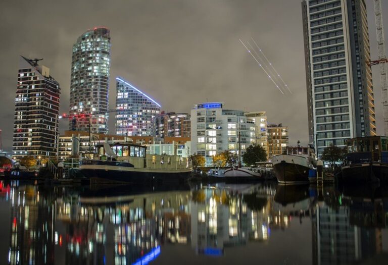 An external photo of builds along by the river side