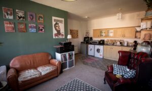 Open plan living room and kitchen in Letchworth flat.
