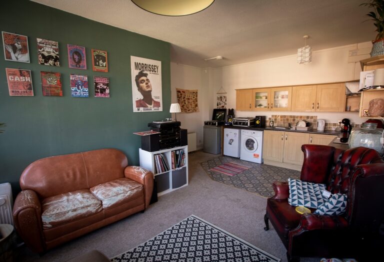 Open plan living room and kitchen in Letchworth flat.