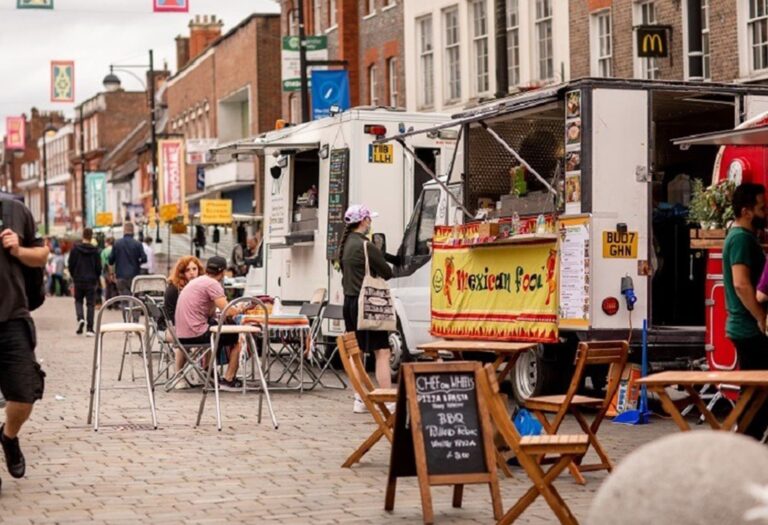 Food vendor trucks in a high street