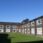 Low-rise flats in peaceful grassy setting